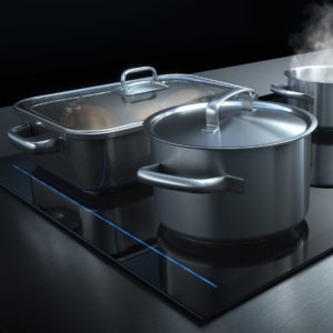 Bild zeigt ein Kochfelnd mit 3 Töpfen - Elektrogeräte bei Sehl & Göbel